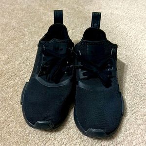 All black Adidas NMD Sneakers